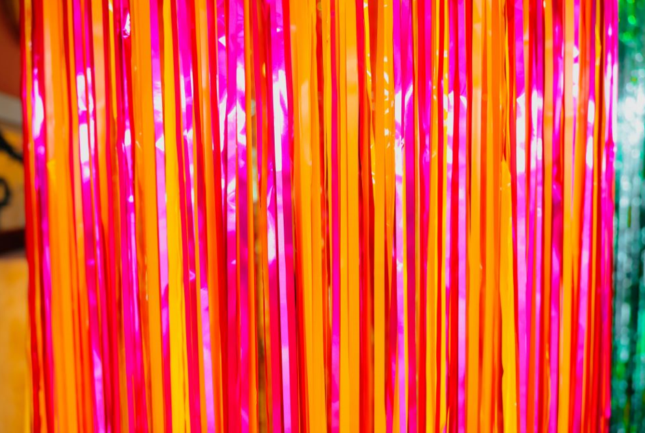 Elevate Your Event with Backdrop Streamers: A Burst of Color and Fun!