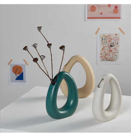 Bulk Hollow-out Ceramic Vases for Flowers U-shaped Ceramic Vase with Dual Openings Wholesale